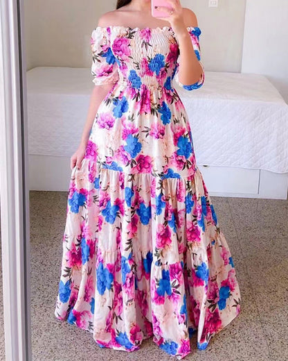 Robe asymétrique à imprimé floral et épaules dénudées 