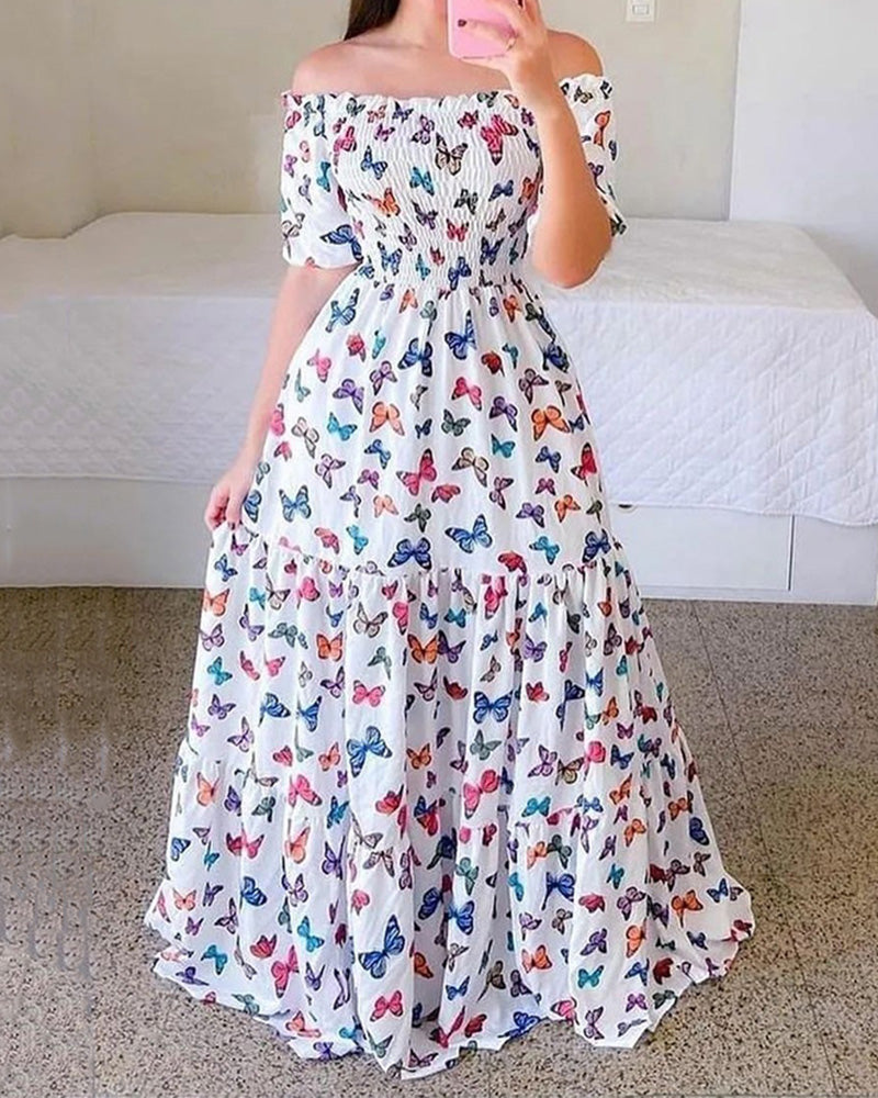 Robe asymétrique à imprimé floral et épaules dénudées 