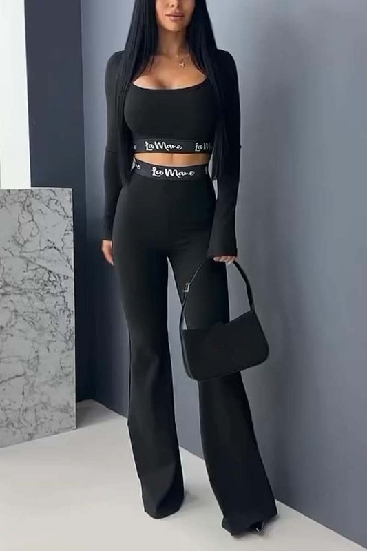 Women's slim fit solid color crop top and flared pants set Black