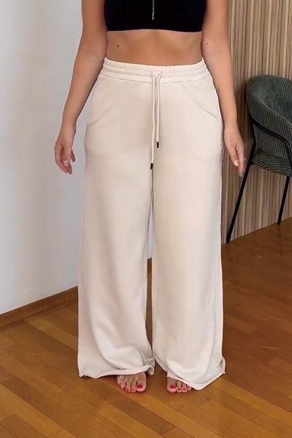 Women's asymmetric cut pullover trousers set